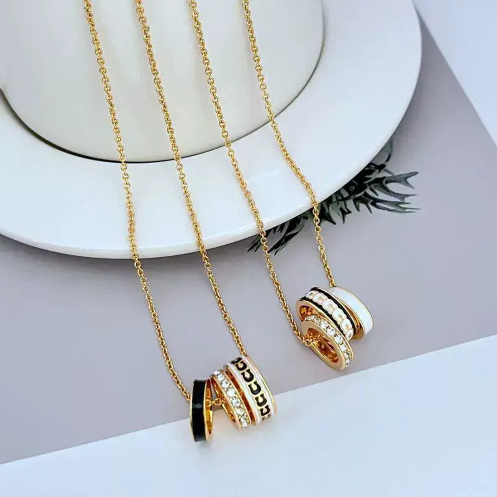 Coach Rhinestone Enamel Geometric Triple Ring Necklace